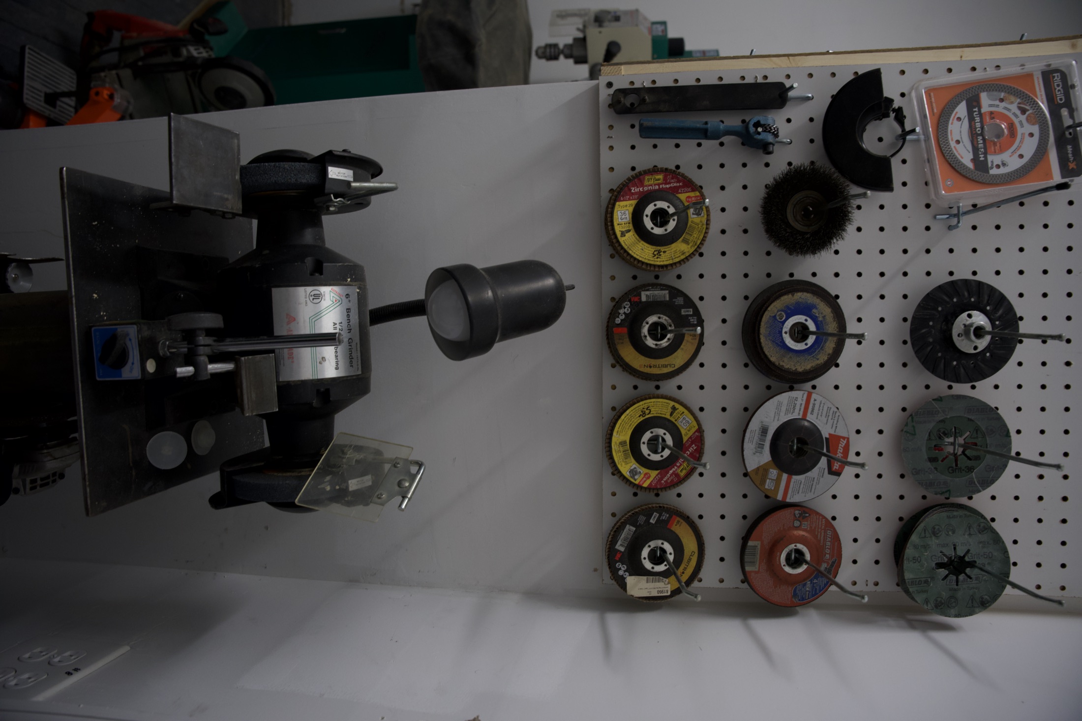 6-inch pedestal grinder and grinding wheel storage at Brooklyn Industrial Arts